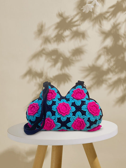 VOLUME 1:    Black crochet bag with ferozi and pink flowers