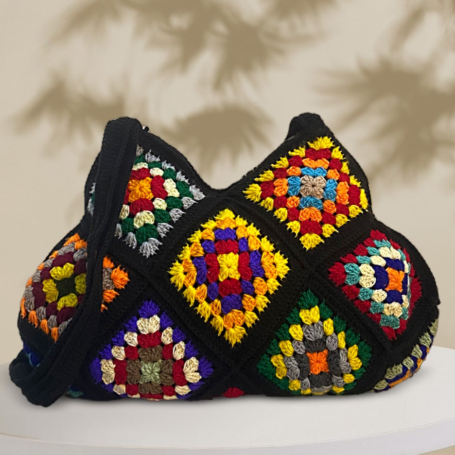 VOLUME 1:      Black beautiful crochet bag with different patterns